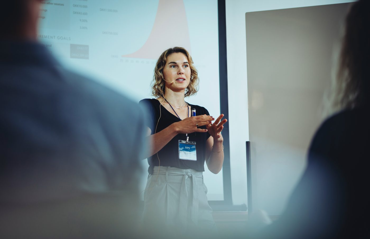 Conference presenter speaking to an audience